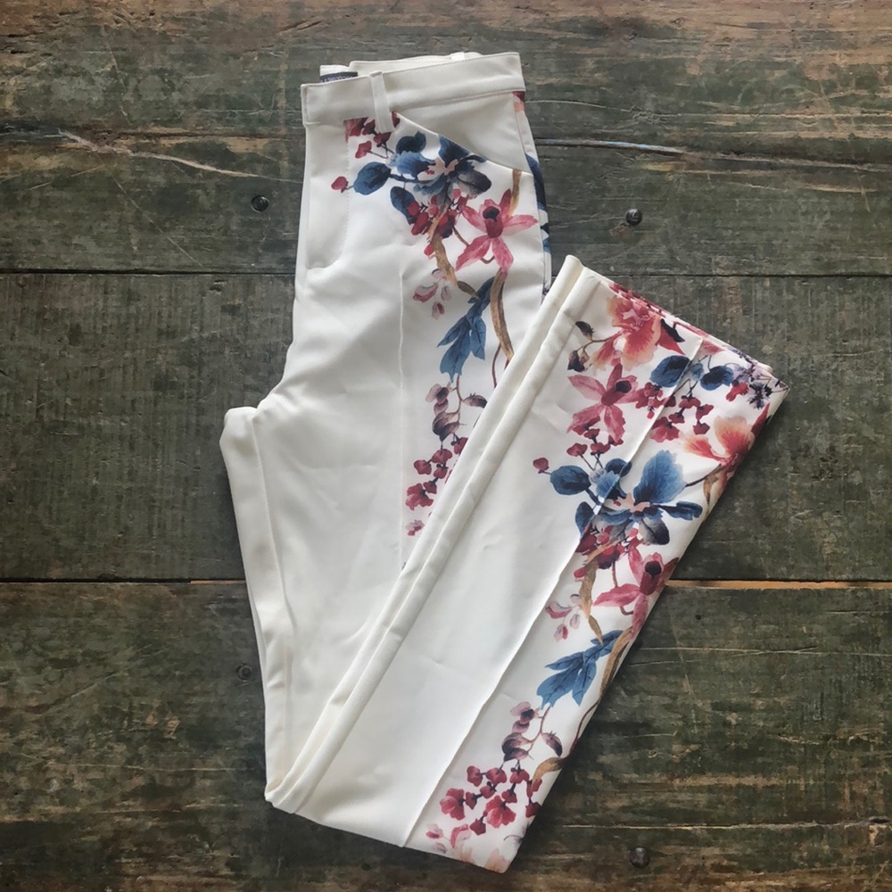White pants with floral pattern